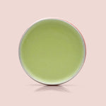 close up of soothing baby eczema balm texture with tamanu nut oil for inflamed skin